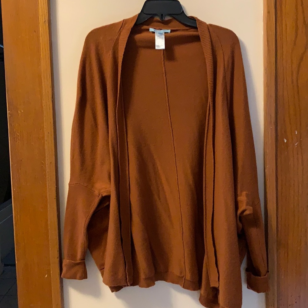 burnt orange colored drapey cardigan